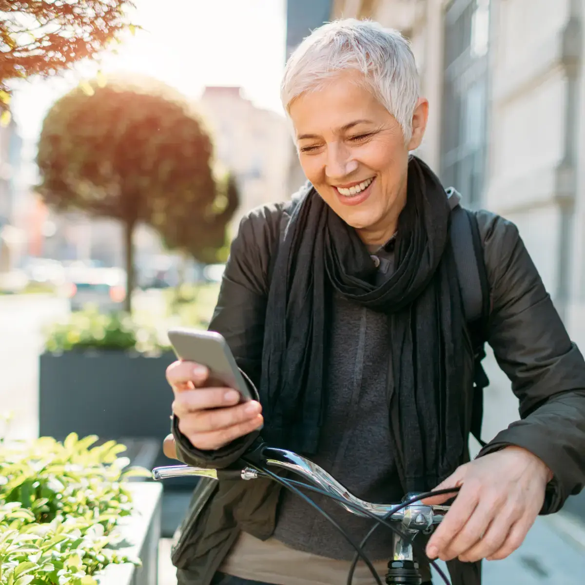 women-on-bike-with-mobilephone-1200x1200-01